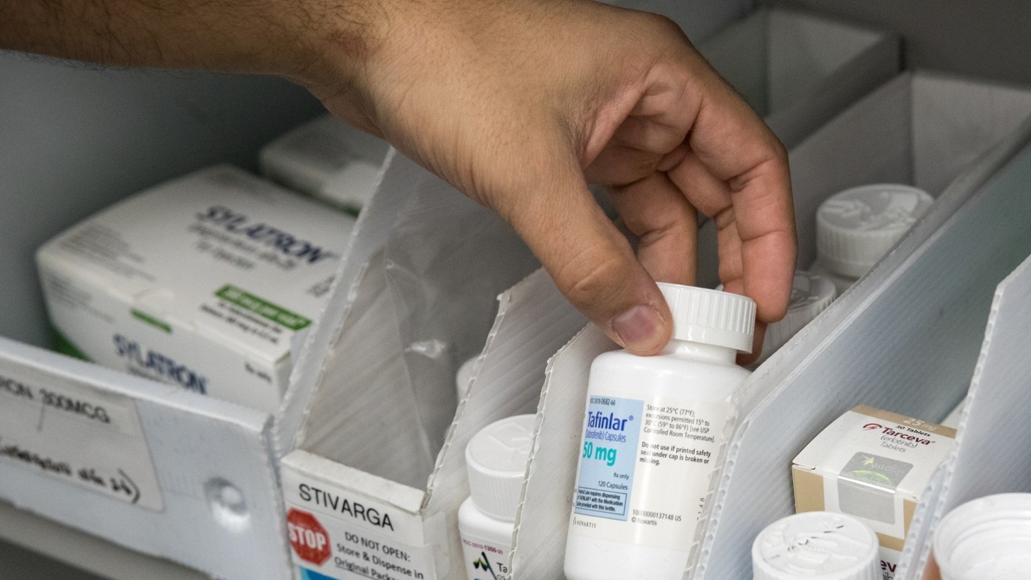 medication on a pharmacy shelf