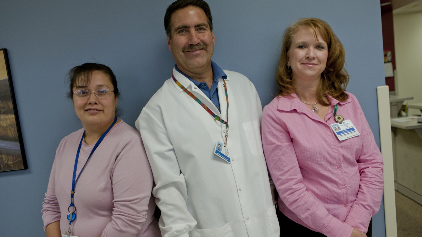 Group portrait of three health care workers